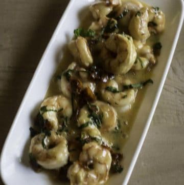 shrimp served with a basil garlic butter