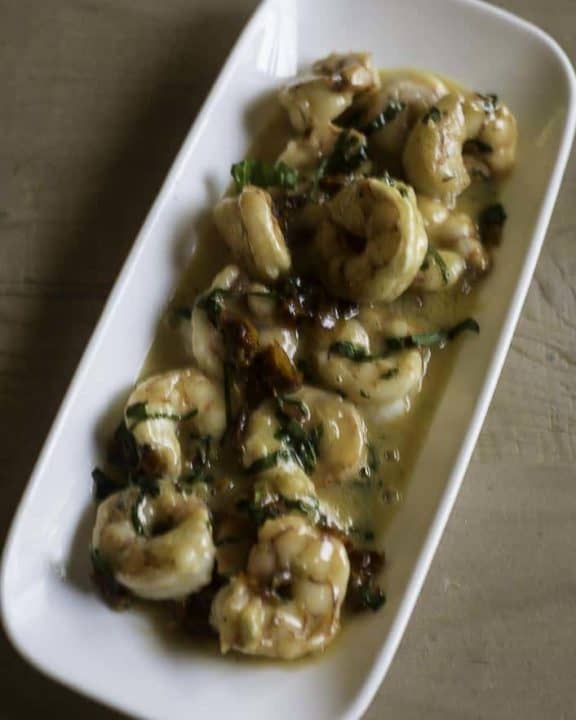 shrimp served with a basil garlic butter