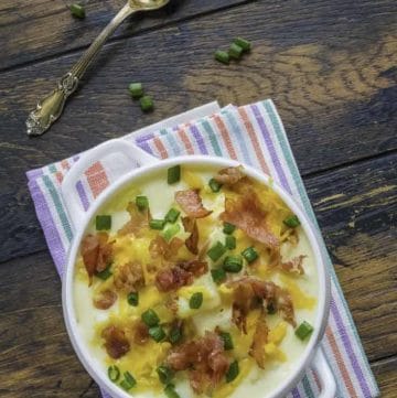 Bowl of baked potato soup that tastes like Bennigan's.