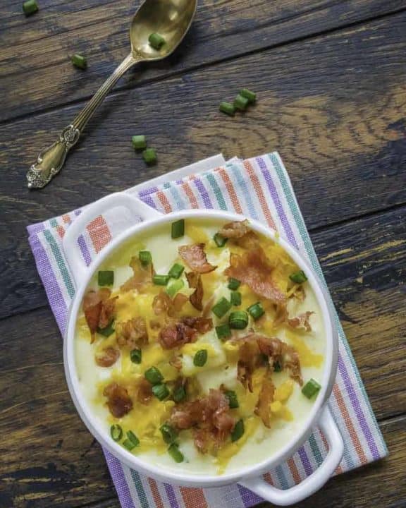 Bowl of baked potato soup that tastes like Bennigan's.