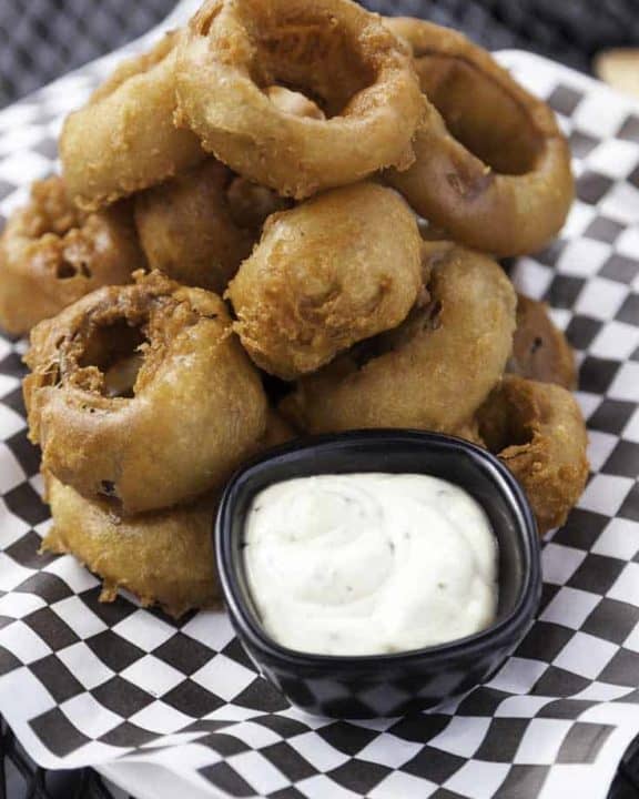 You can make Simon and Seaforts Beer Battered Onion Rings at home with this easy copycat recipe.