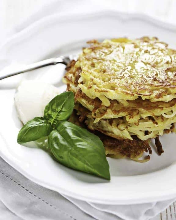 a stack of potato pancakes on a plate