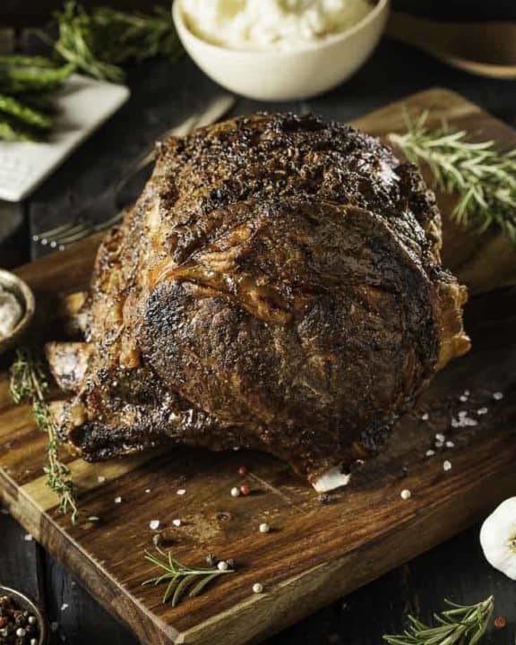 Roast beef on a wood cutting board