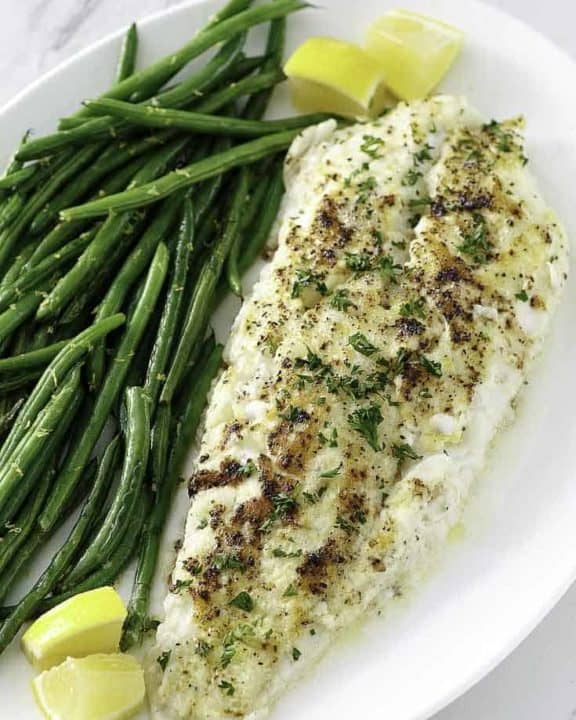 baked white fish on a plate