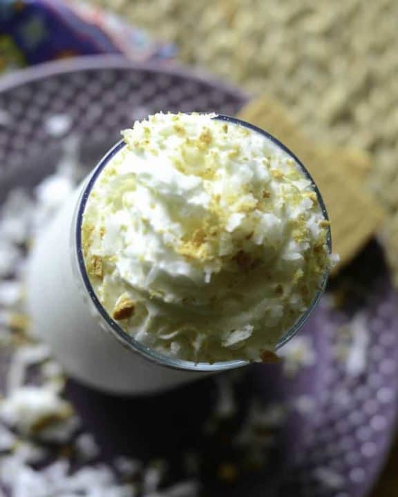 top of a coconut cream pie milkshake