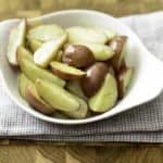 Homemade Boston Market Garlic Dill Potato Wedges in a white dish