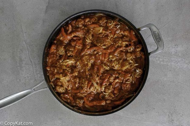 Italian sausage and peppers in a skillet