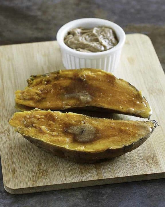 Homemade copycat Outback Steakhouse Sweet Potato topped with honey butter, cinnamon, and brown sugar.