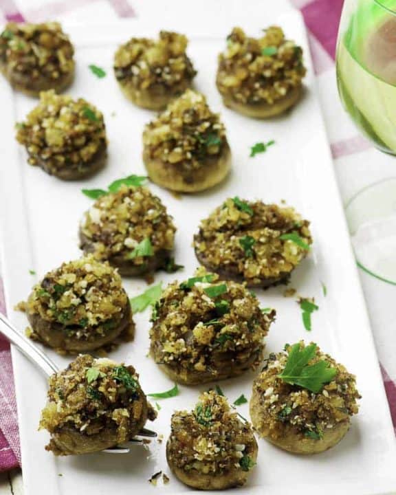 Vegetarian stuffed mushrooms are so easy to make, these are the perfect appetizers for your holiday party