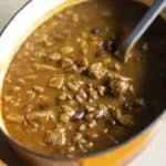 Baked Beans with Smoked Sausage in a Dutch oven