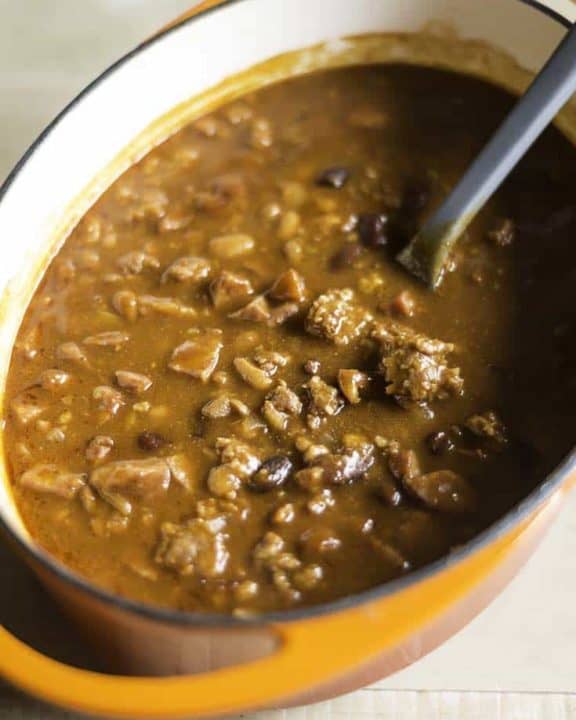 Baked Beans with Smoked Sausage in a Dutch oven