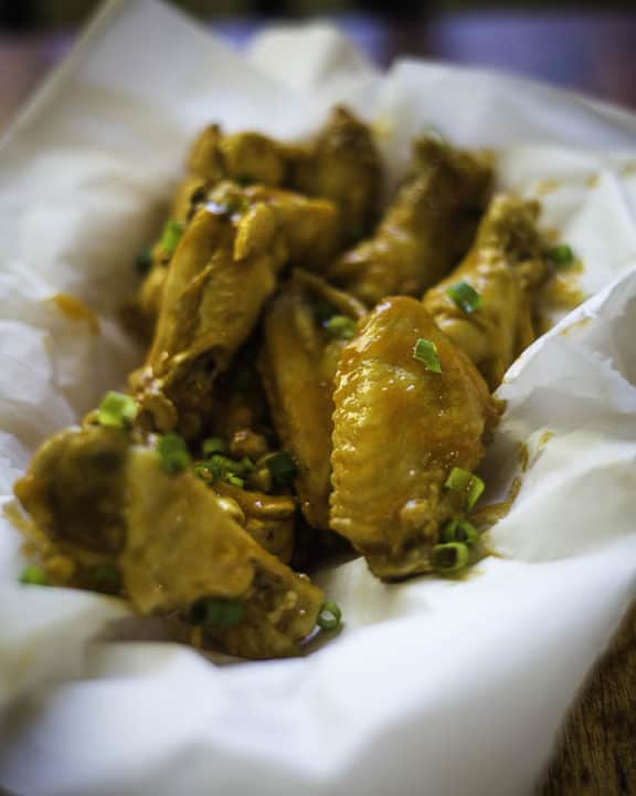garlic buffalo wings in a basket