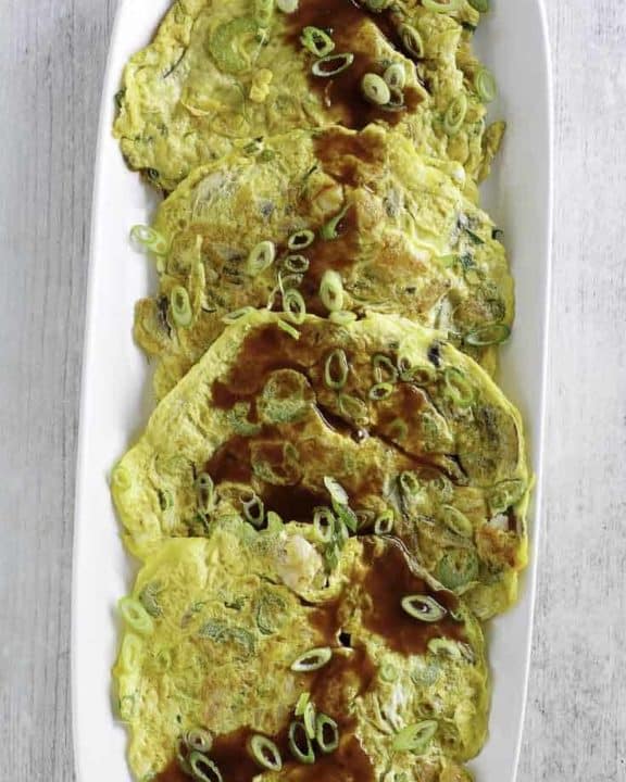 Egg Foo Young with Gravy on a serving platter.