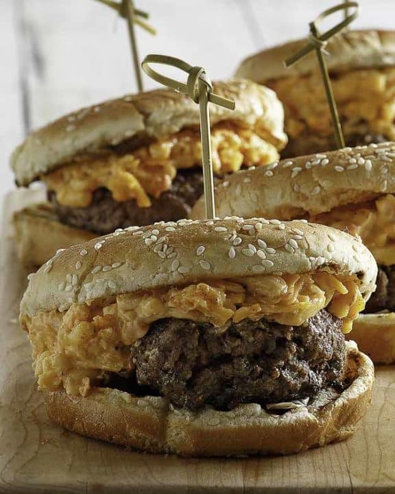Burgers topped with pimento cheese spread.