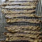 A pound of bacon that has been cooked in the oven.