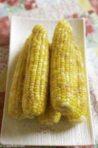 Homemade Red Lobster Chesapeake Corn on the Cob on a serving platter.