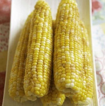 Homemade Red Lobster Chesapeake Corn on the Cob on a serving platter.