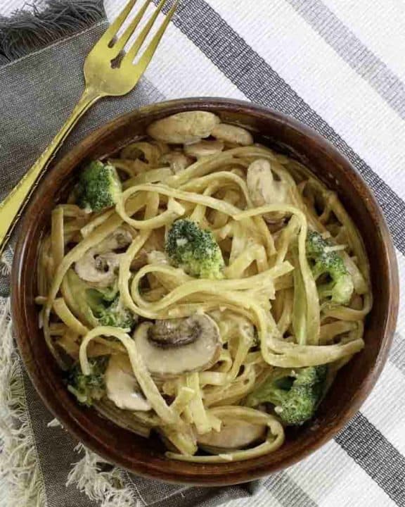 a bowl of broccoli pasta