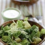 Homemade copycat Outback Steakhouse caesar salad served with homemade caesar salad dressing