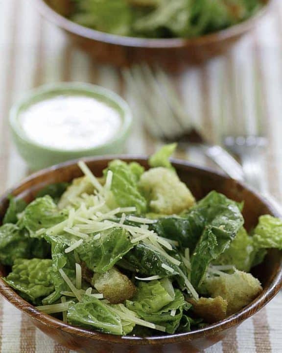 Homemade copycat Outback Steakhouse caesar salad served with homemade caesar salad dressing