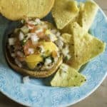 a juicy turkey burger with pico de gallo and cheese