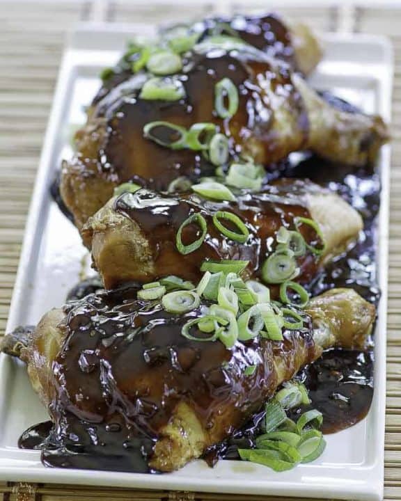 chicken shoyu with green onion slices on top
