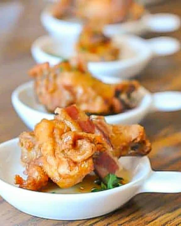 Honey Habanero Chicken Wings in small appetizer bowls.