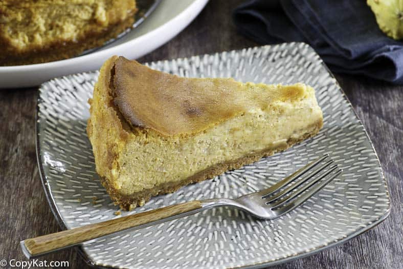 a slice of pumpkin cheese cake on plate