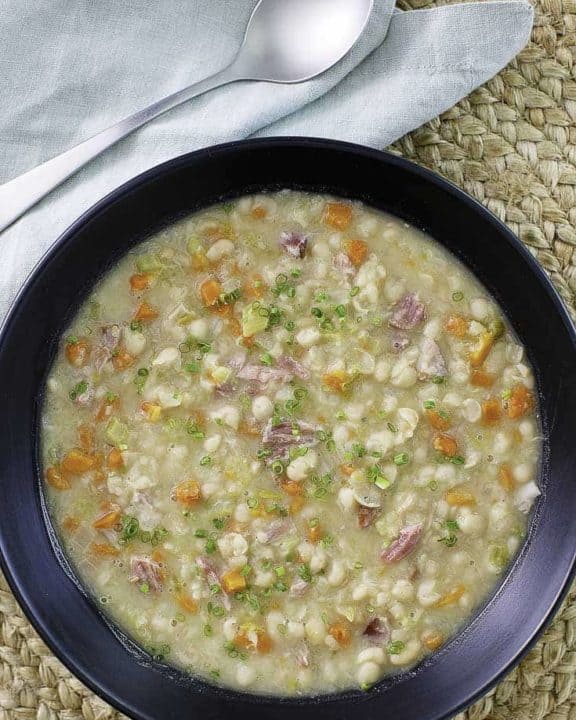 A bowl of soup made with navy beans