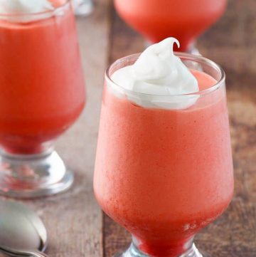 Jello 1-2-3 Layered Dessert topped with whipped cream