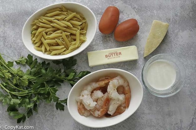 penne pasta, medium sized shrimp, Parmesan cheese, tomatoes and more
