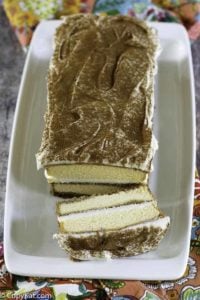 a tiramisu with one slice cut