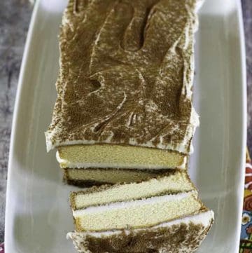 a tiramisu with one slice cut