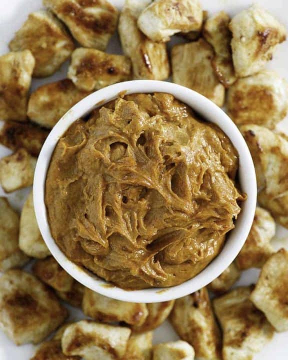 a bowl of homemade yum-yum sauce with grilled chicken