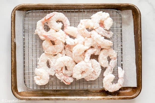 breaded shrimp on a rack