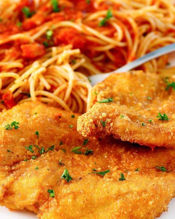 Romano crusted chicken and pasta with marinara sauce