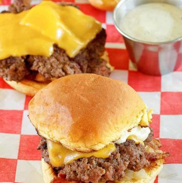 mini hamburger (slider) on red and white checkered parchment paper