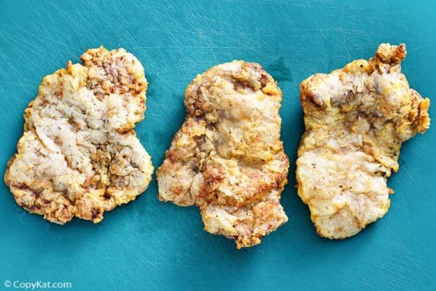three chicken fried steaks