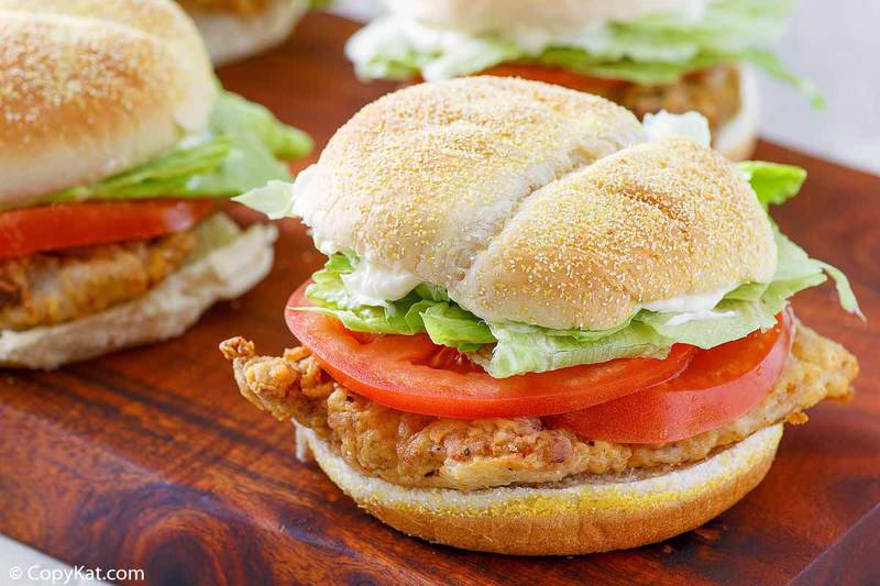 chicken fried steak sandwich with lettuce and tomato