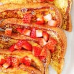 slices of French toast with chopped strawberries on top