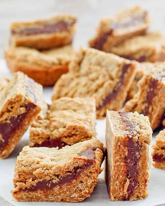 several fudge jumbles cookie bars on top of parchment paper