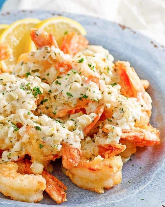 homemade Olive Garden classic shrimp scampi fritta on a blue plate
