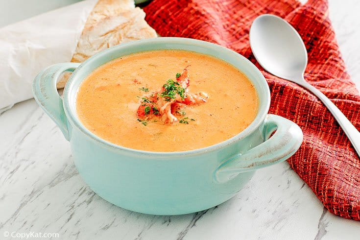 crawfish bisque in a light blue soup crock