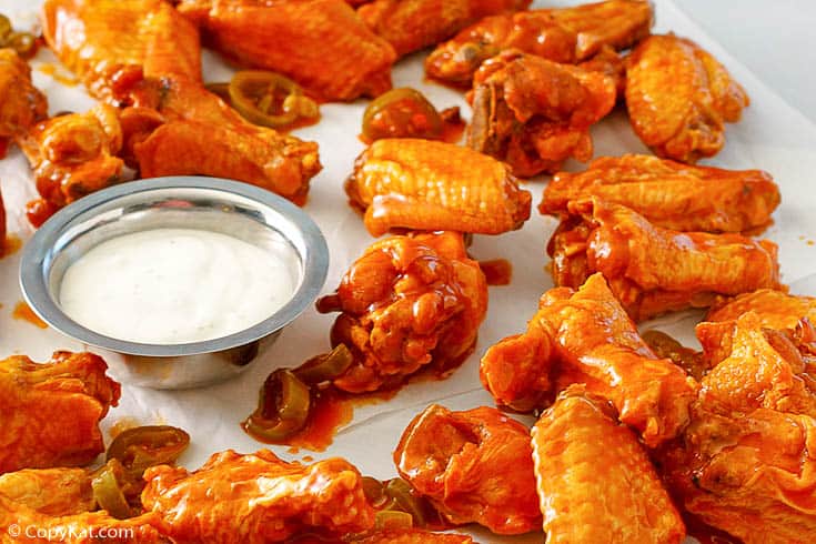 homemade jalapeno Buffalo chicken wings and blue cheese dressing