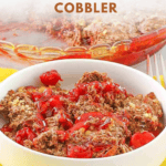 A bowl of cherry chocolate cobbler