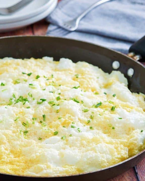fluffy omelette in a non-stick skillet