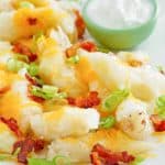 mashed potato spring rolls on a platter