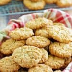 a basket filled with oatmeal coconut crunchies cookies