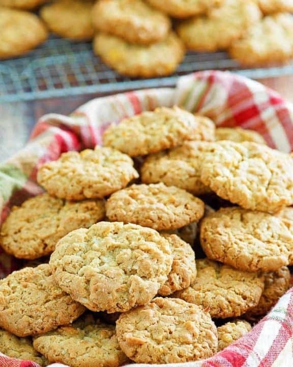 a basket filled with oatmeal coconut crunchies cookies
