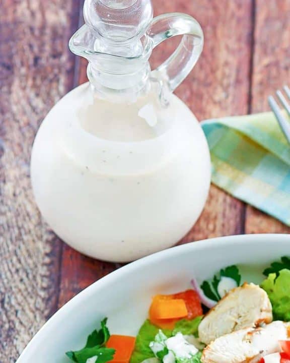 a bottle of homemade Old Spaghetti Factory creamy pesto dressing